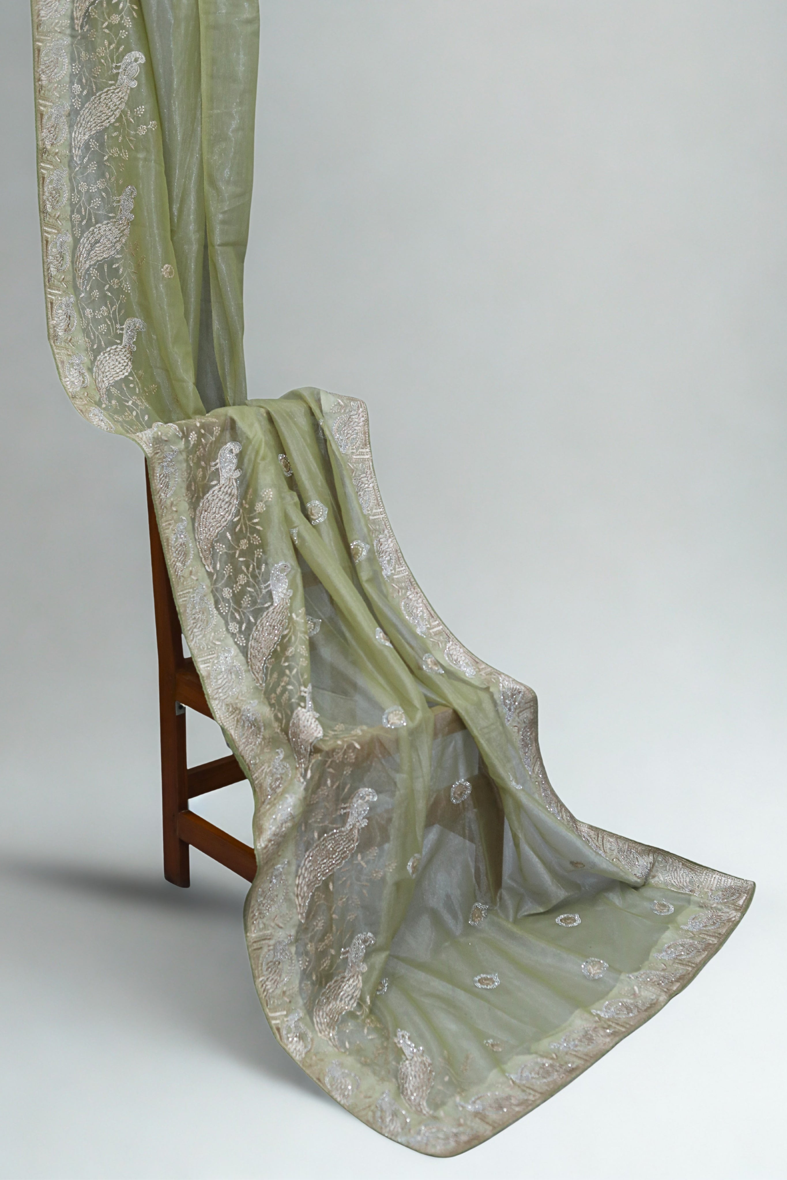 Pastel Pistachio Green Organza Tissue Saree with Peacock border