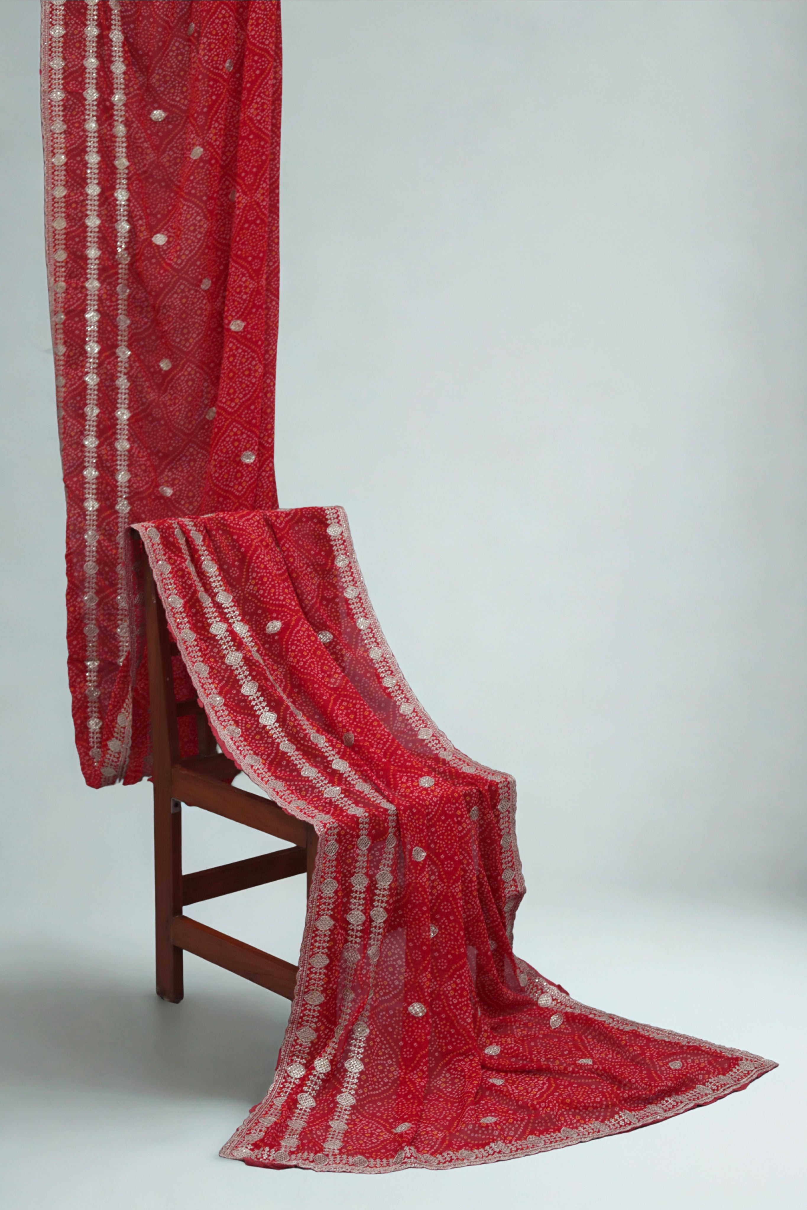 ISHNA Red Bandhani Saree With 3 Line Border and Chip Work