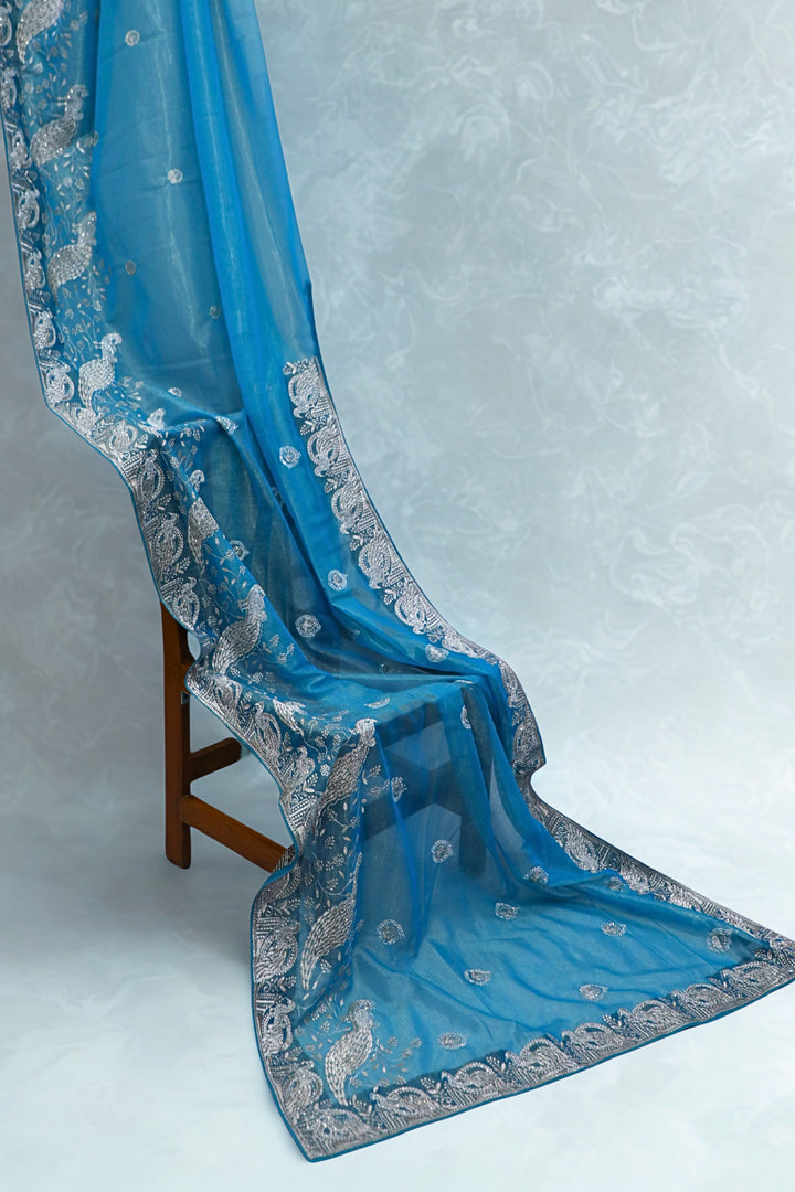 Blue Organza Tissue Saree with Peacock Border