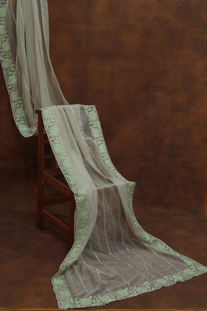 ISHNA Pista Green Organza Tissue Saree with Flower Border