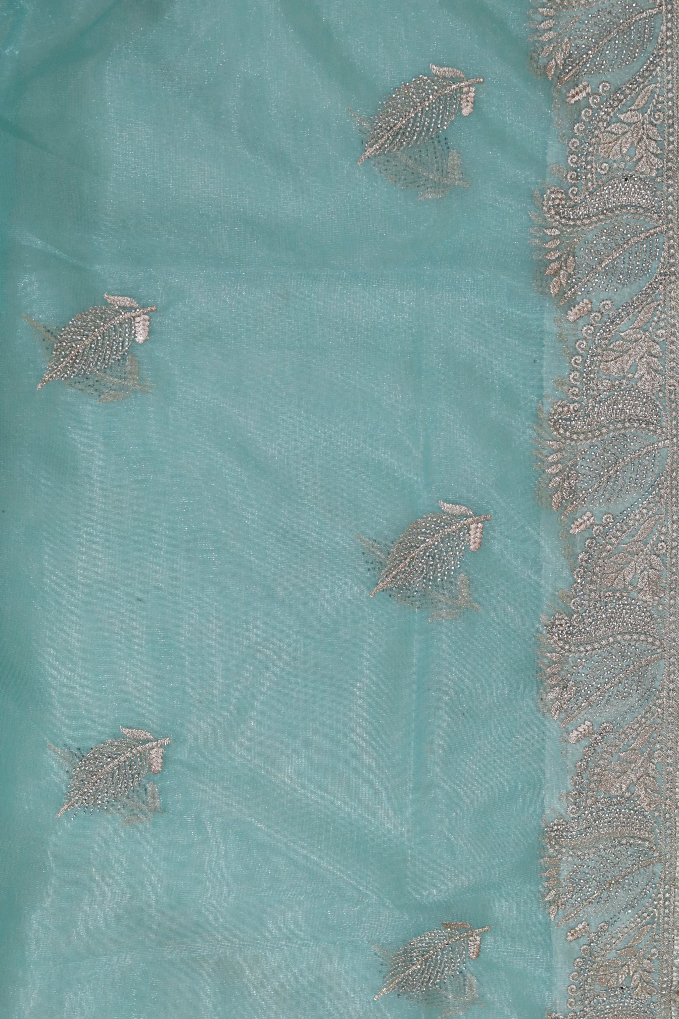 ISHNA  Sky Blue Organza Tissue Saree with Stone leaf Border