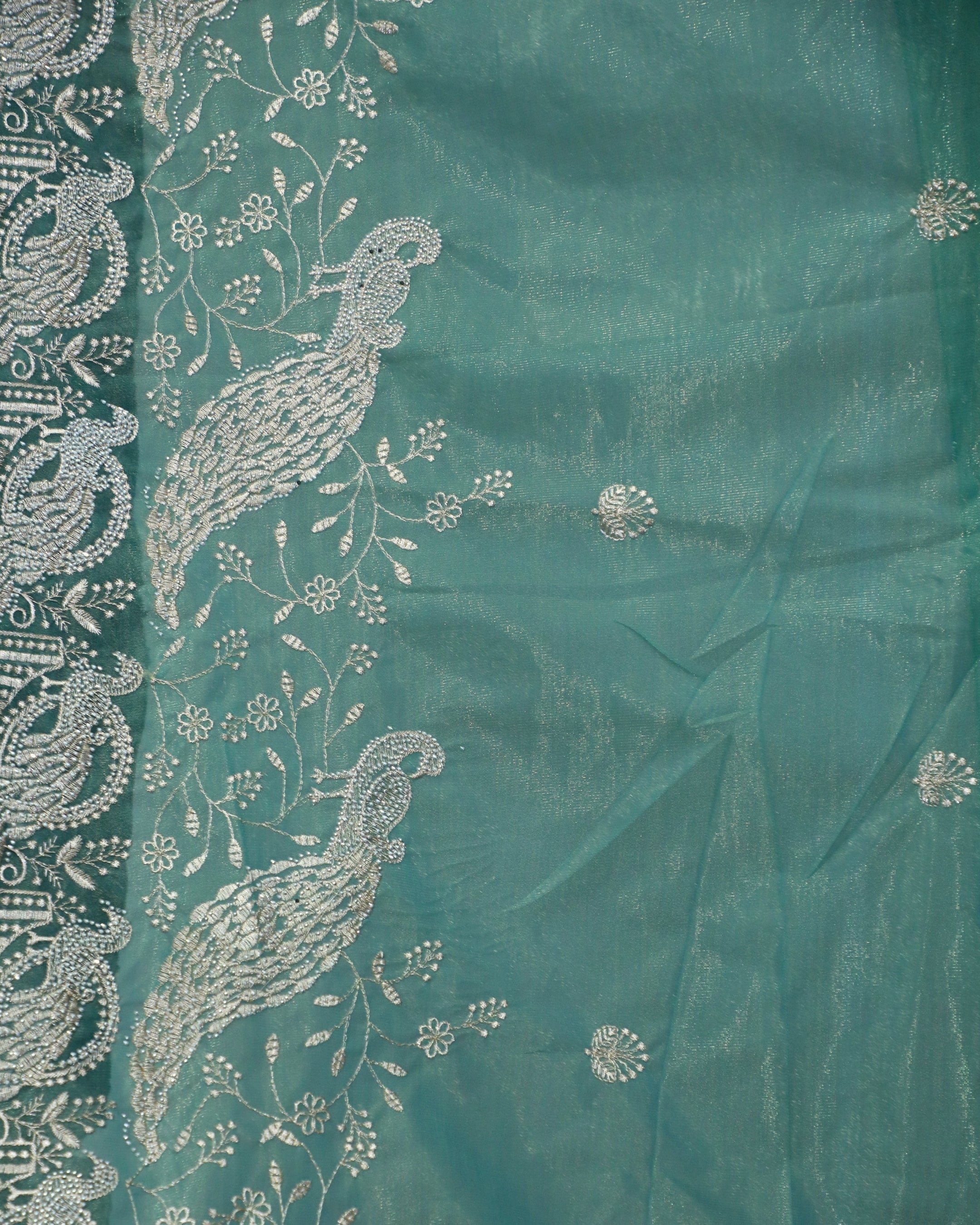 Sea Green Oganza Tissue Saree with Peacock Border