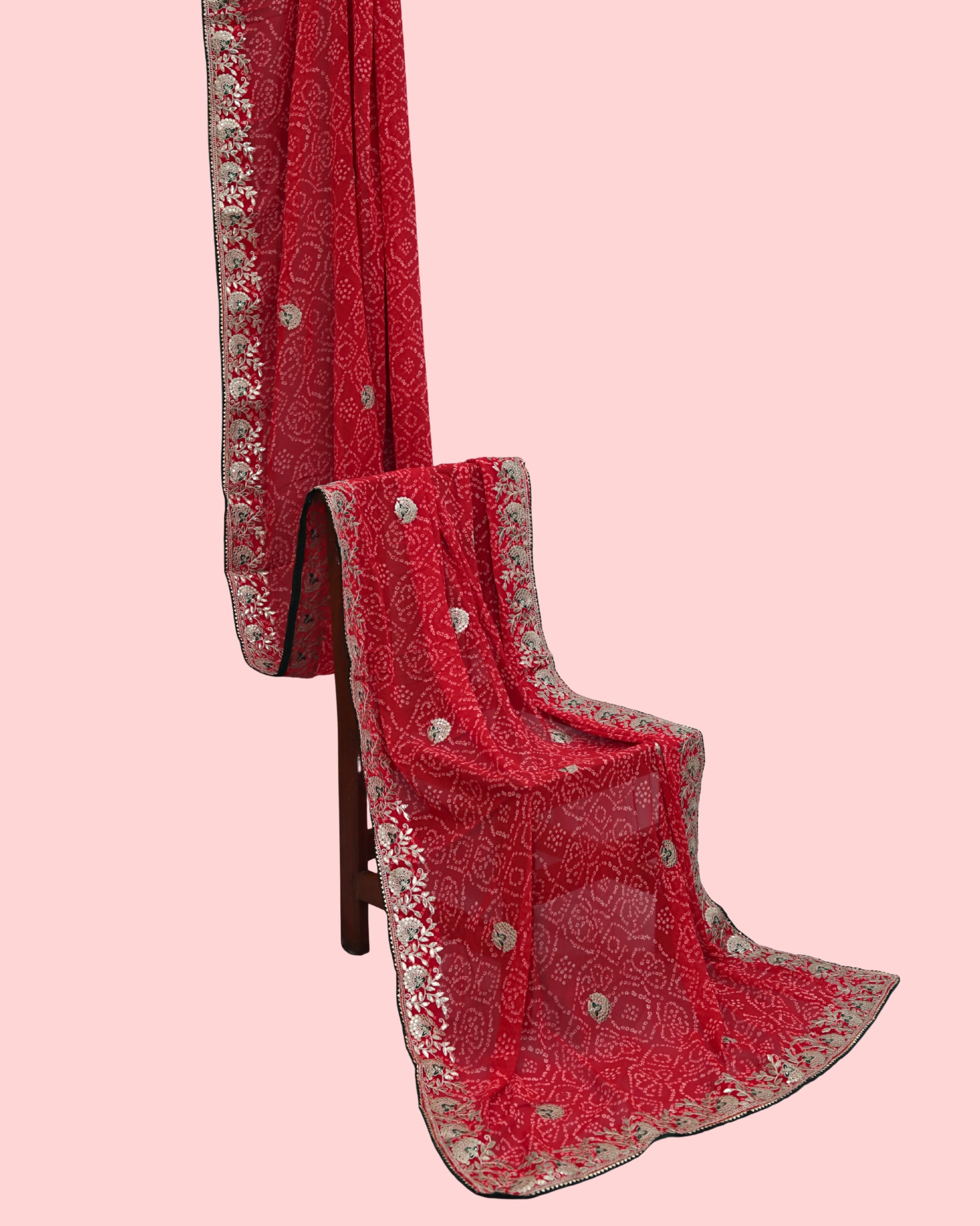Ishna Red bandhani saree with Rounded layered petal border