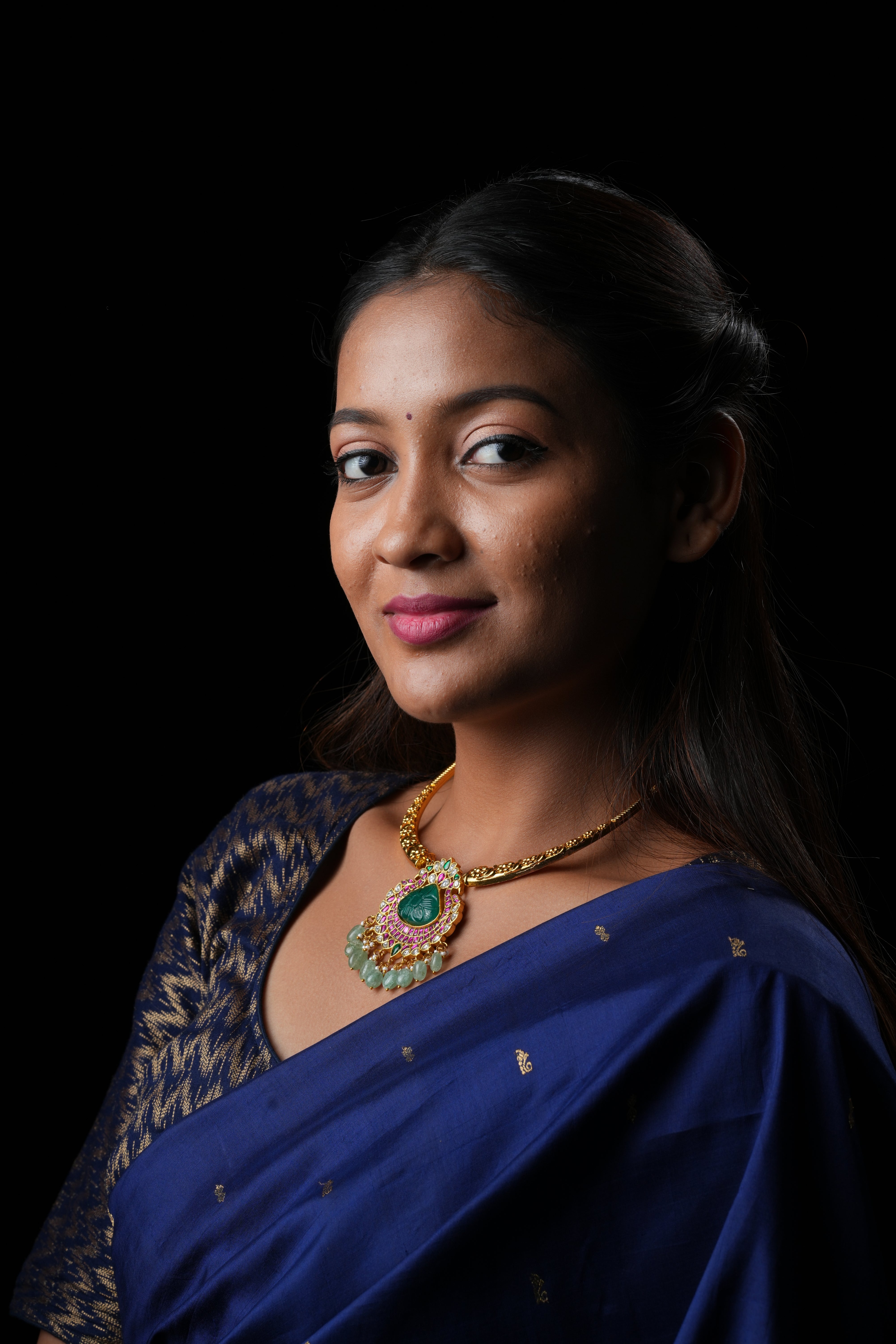 Regal Kanthi Necklace with Hand-Caved Center Stone