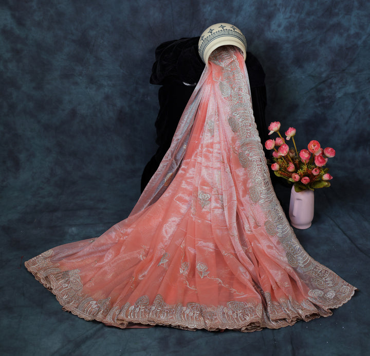 Champagne Peach Light Weight Premium Organza Saree With Floral Embroidary Jari Border