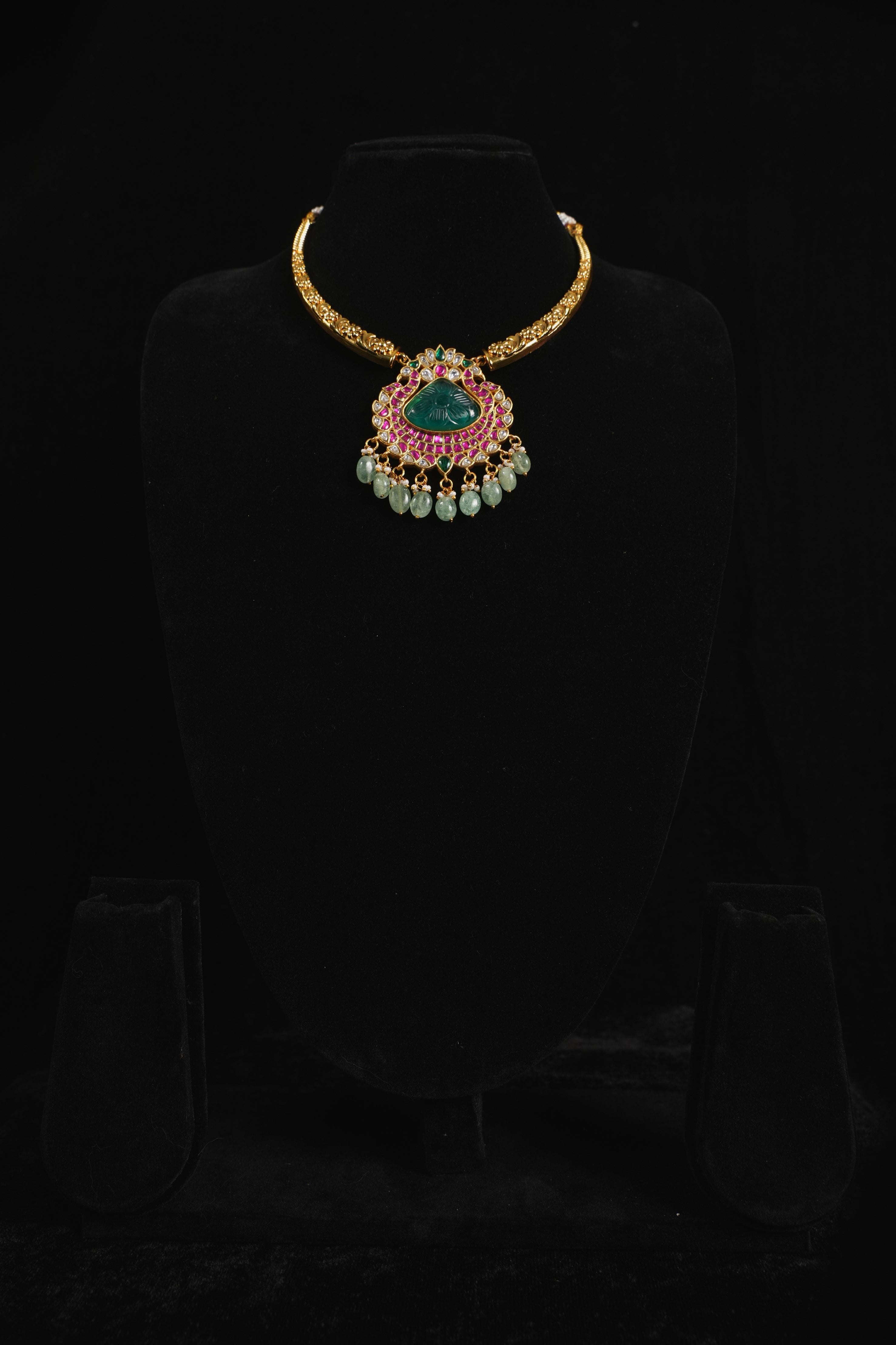Regal Kanthi Necklace with Hand-Caved Center Stone