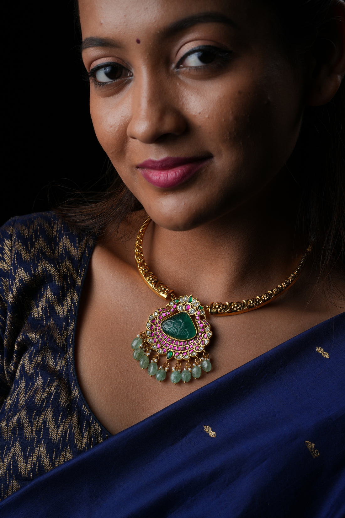 Regal Kanthi Necklace with Hand-Caved Center Stone